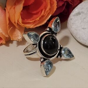 Black Onyx / Sky Blue Topaz Flower Ring